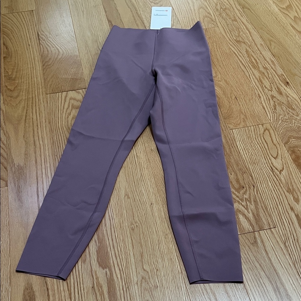 Lululemon SZ 6, Glow up HR tight 25” in lavender lux.
